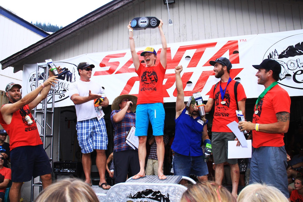 Volunteers celebrate victory during the Volunteer Trifecta at the Downieville Classic