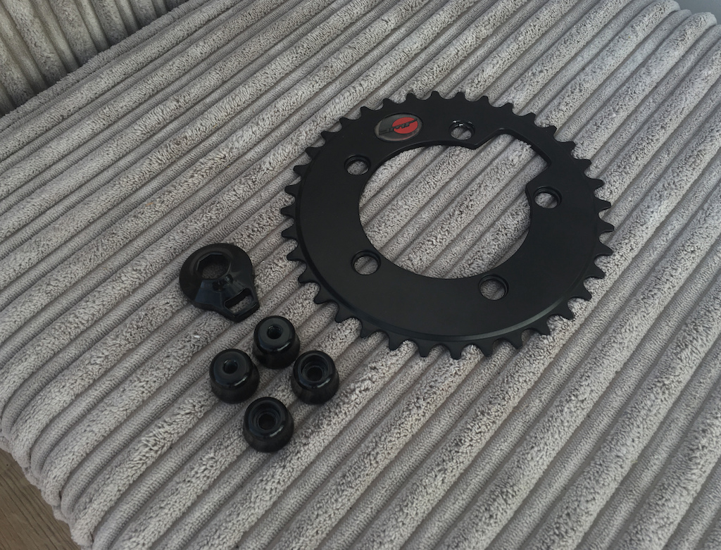some bits i had powder coated: DMR Saturn Chainring, Rockshox SID Compression Dial and some nuts off my Ti Skewers