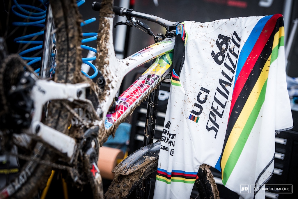 Logic finally got to christen the rainbow jersey with a mix of Lourdes' holy water and divine mud.