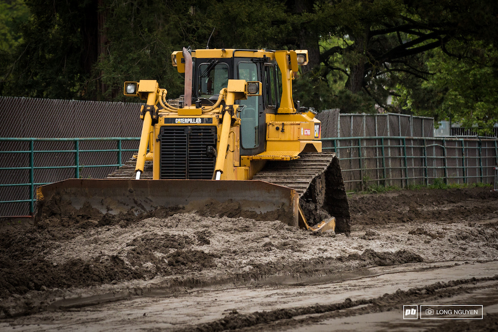 The big machines were clearing out the mud.