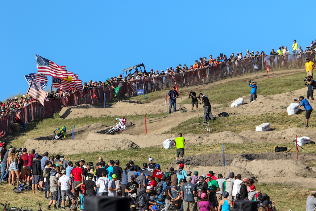 Beerten and Buchanan battle as the crowd looks on with the infamous turn one images in the backdrop.
