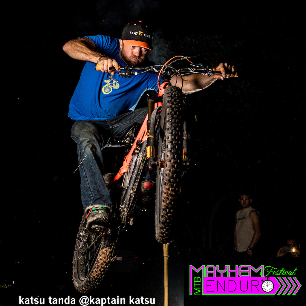 A rider soars through the night during the Paradise Garage Night Games event at the Mayhem Enduro Bike Festival in Cumberland, Ohio on May 28, 2016.