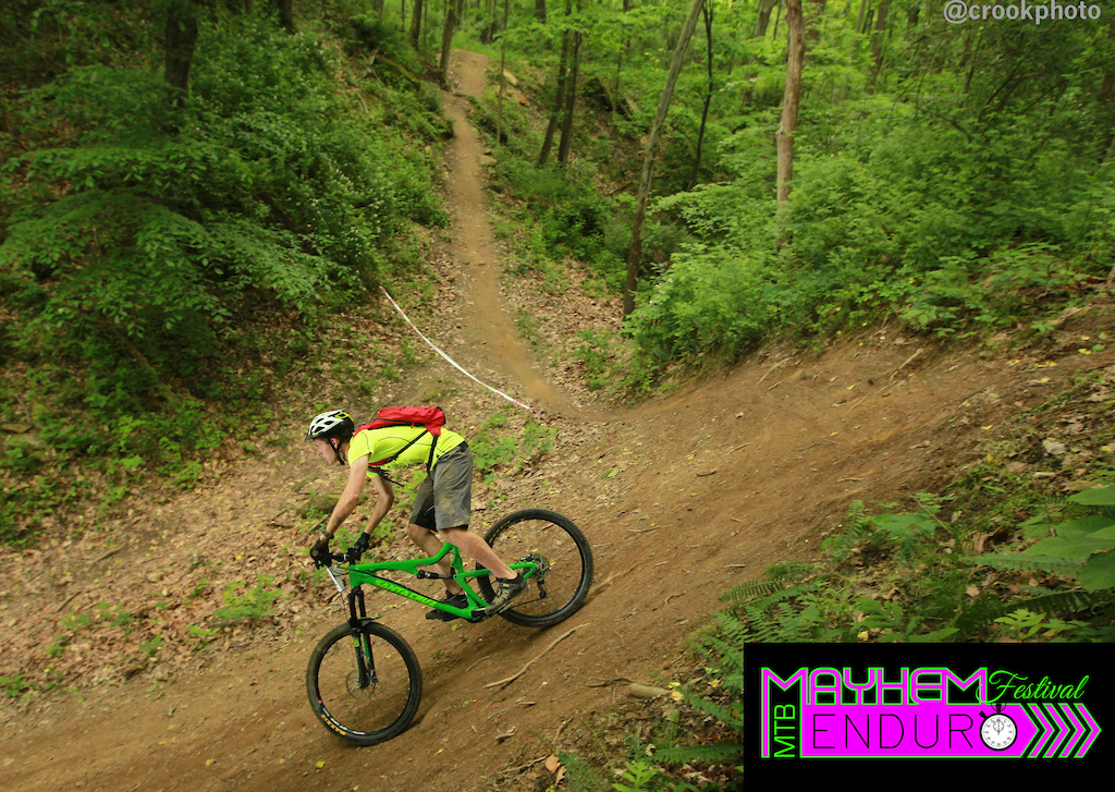 A rider on the second stage of the five-section Mayhem Enduro on the Wilds Mountain Bike Trails in Cumberland, Ohio on May 29, 2016.