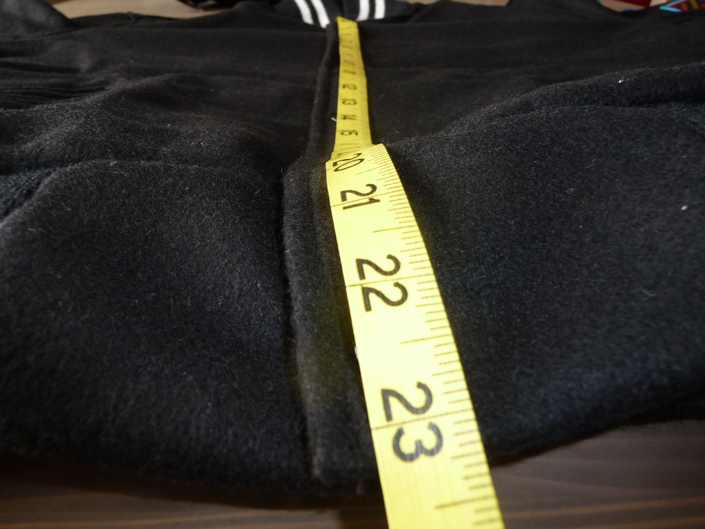Rapha Jacket Size MEDIUM.

Length from lower neck 23".