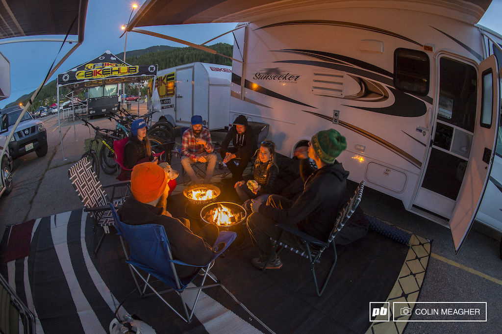 Chris Andreason and the Bike Hub crew out of Spokane WA mulling over the day s war stories around a couple cozy camp fires under the clearing skies at the camp area below the Silver Mountain gondola in Kellogg ID.
