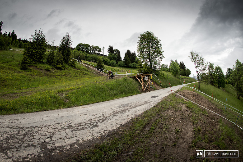 Slick and muddy corners lead to the final road gap on track where riders will have finally have the finish line in sight.