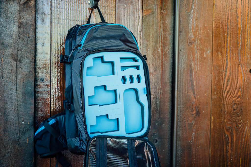 The bag's GoPro compartment can hold up to 3 cameras and a range of small accessories.