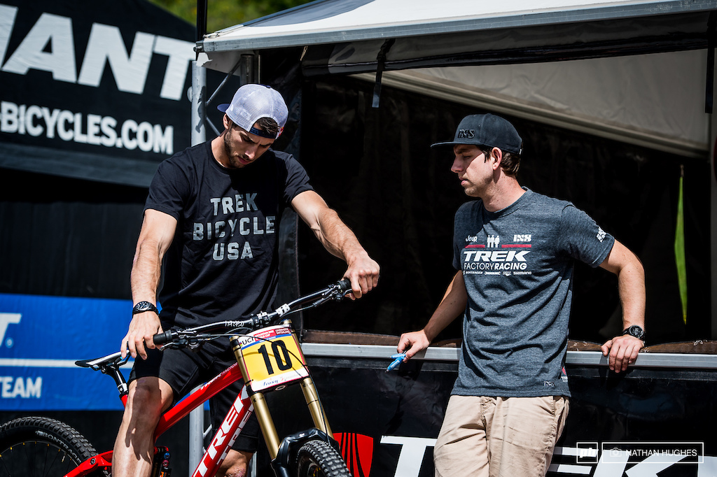 Gee Atherton getting the set-up right with mechanic Polish Pete.