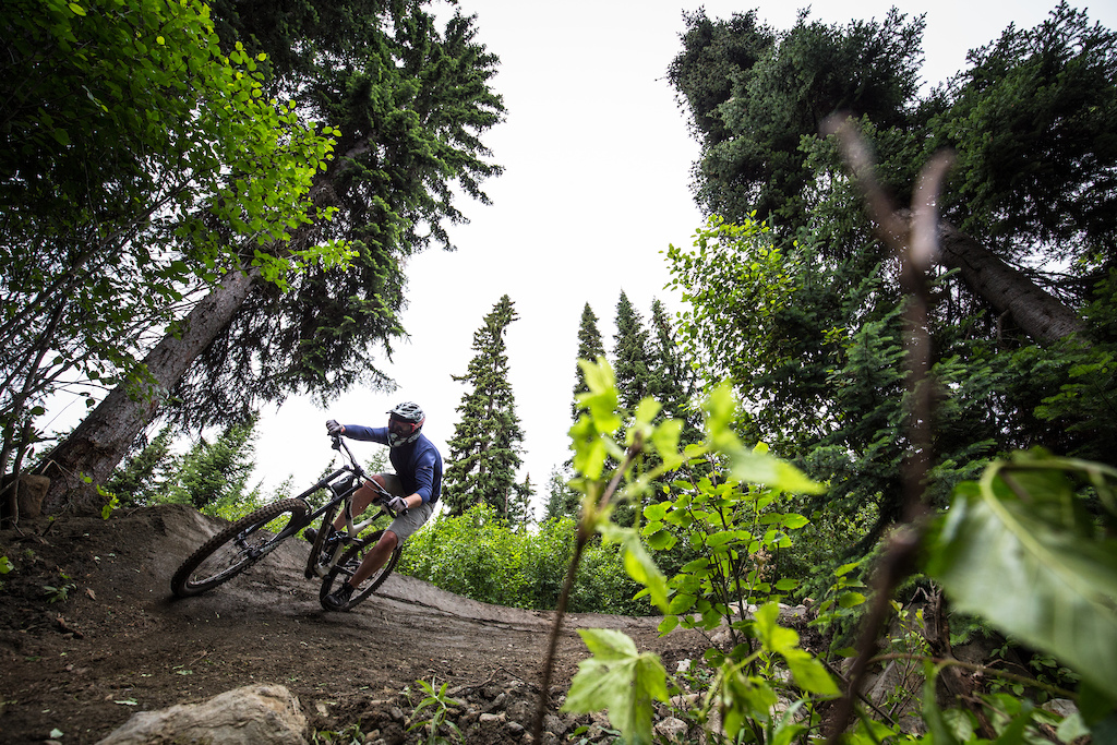 Scoping out the brand new Resurrection trail in the Sun Peaks Bike Park, between storms with Tourism Sun Peaks' Kyle Taylor.