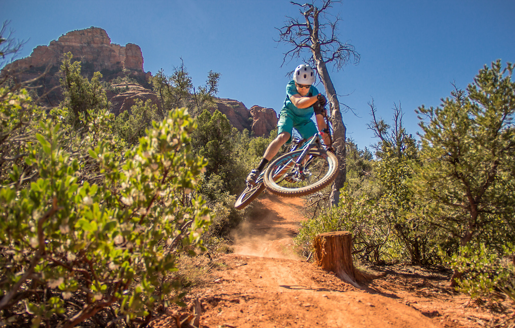 Sam shows us what a whip looks like beneath the towering presence of Sedona's red rock.