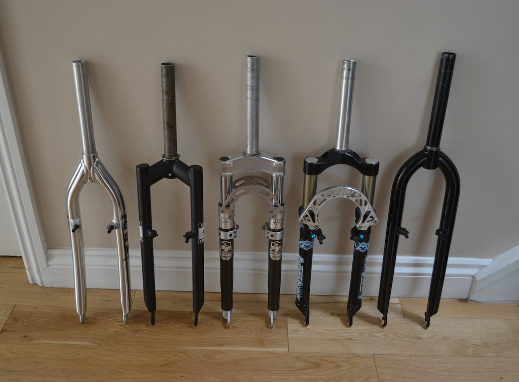 Retro ish selection of forks. suspension and rigid. from left to right;

1: Onza Flyguy
2: On One Cro/mo
3: 1995 Pace RC35MXC
4: 1999 Marzocchi Bomber Z2 Superfly
5: Surly Instigator