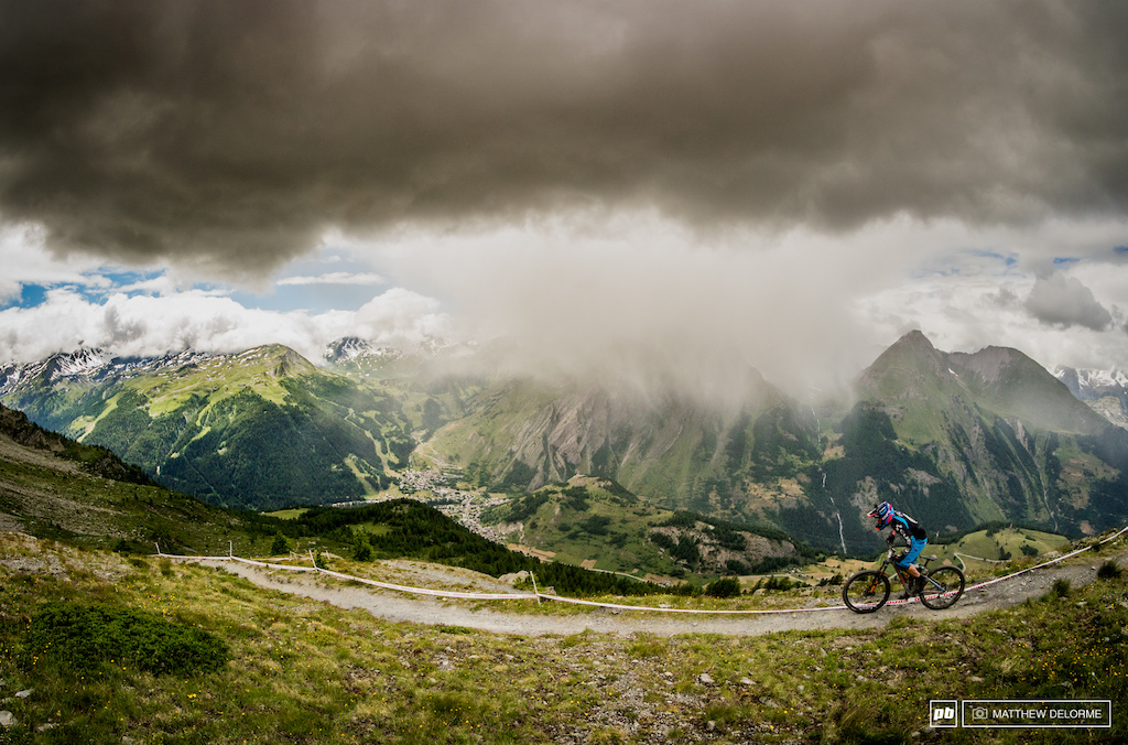 Nico Lau drops into stage one while driving winds and snow try hard to slow him down.