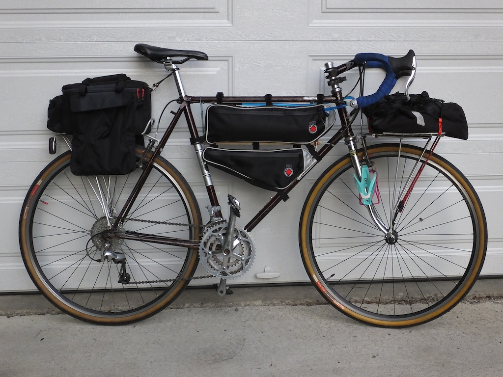 Got the touring bike that is 2x older than me ready to go! Fitted with 2 frame bags, 1 big pannier on the front and a reasonably large top bag in the back.