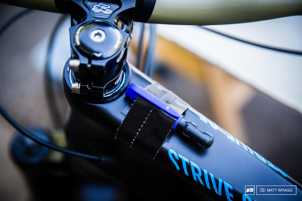 Joe Barnes has one of the neatest tyre plug solutions we have seen so far strapped to his top tube.