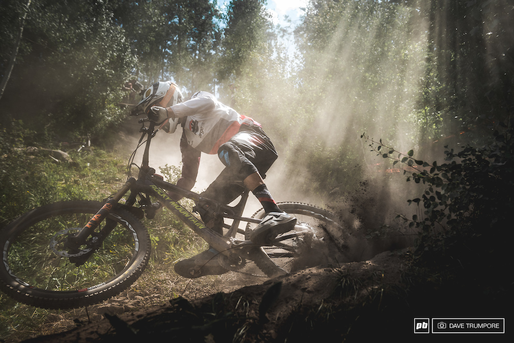 Florian Nicolai powers through the dust and epic light at the bottom of stage 6.