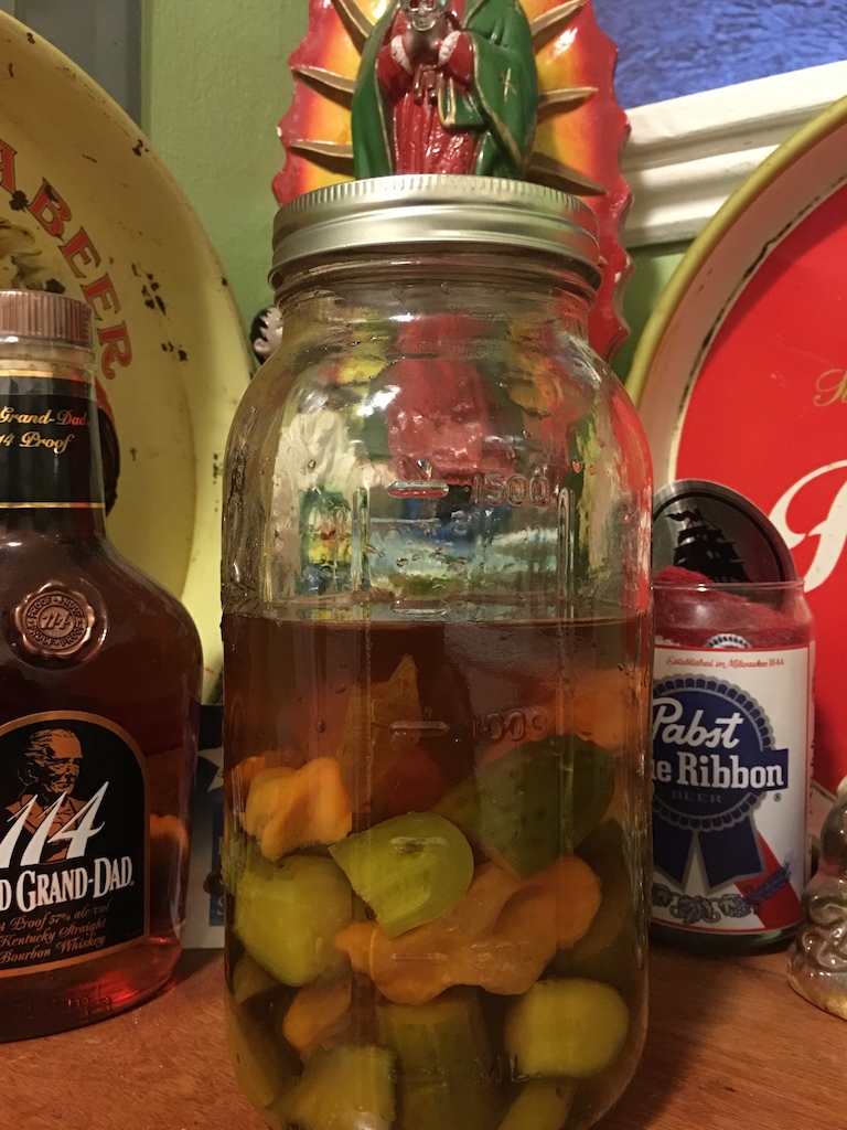 Booze Pickles! I'm a genius! 

Old Grandad Whiskey with roasted habaneros!