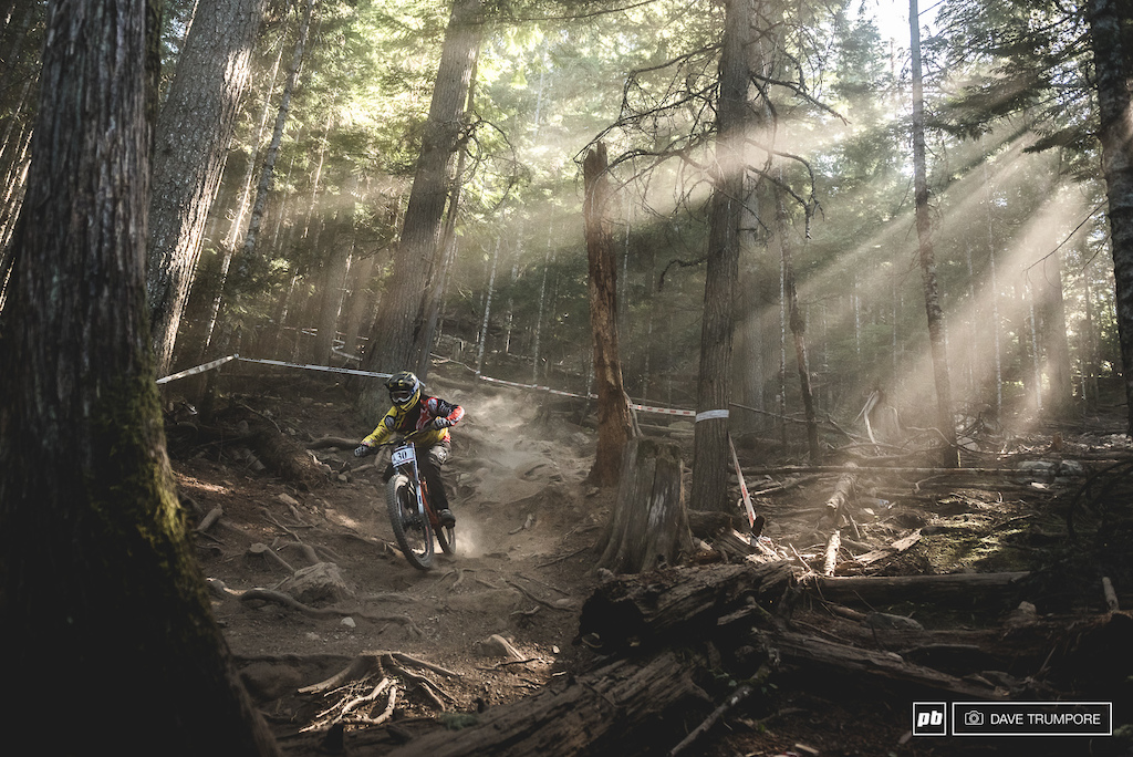 Alexandre Fayolle sends it straight down the main line. Nothing fancy, and way to fast to even notice the epic light firing through the lower woods.