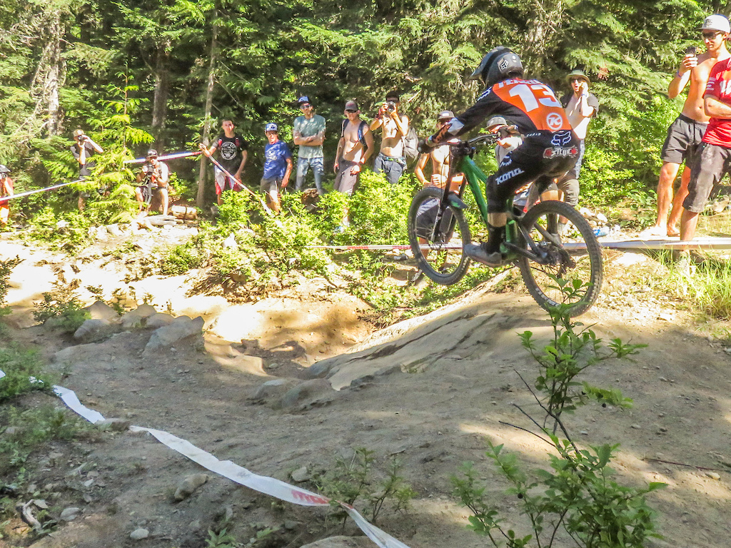 Connor Fearon ripping past during the Canadian open DH at crankworx