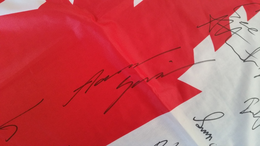 Autographed Canadian Chainsaw Flag Fundraiser for Stevie Smith