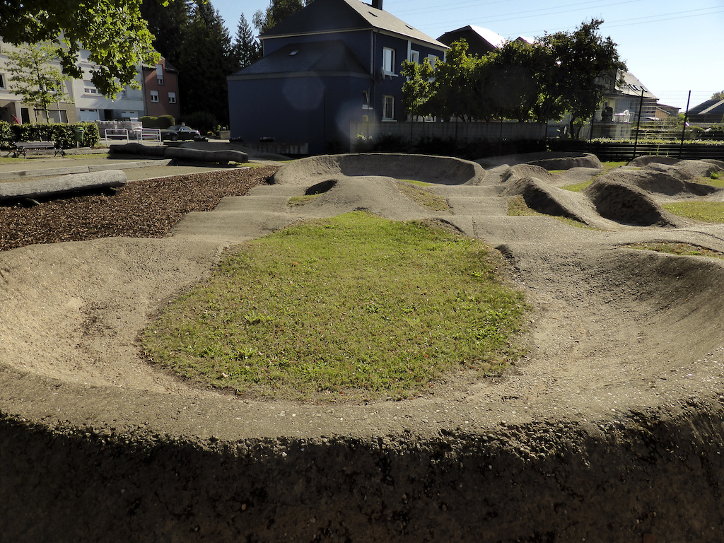 The village Mondercange has a really nice pump track. You can practice you're pumping skills or jumping skills. The dirt is mixed with cement so don't crash because you will hurt you.