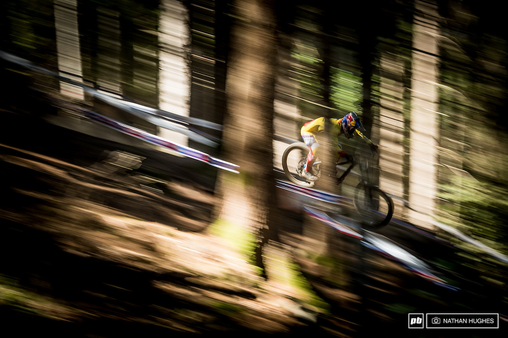 Marcelo Gutierez powering though the trees for team Colombia.