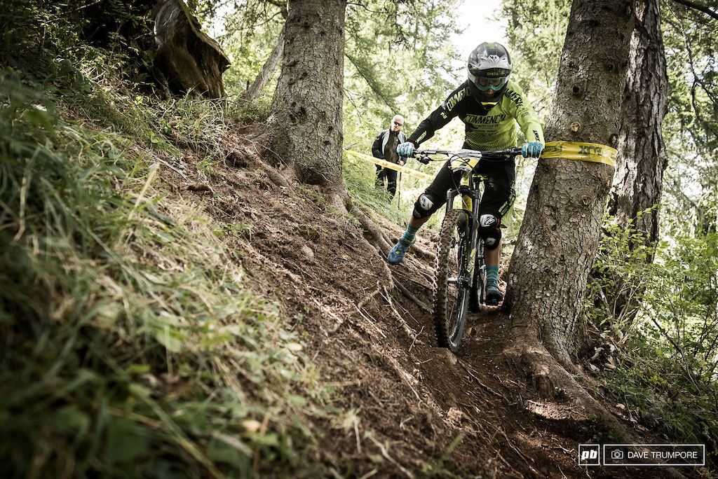Cecile keeps it on line through one of the many rooted out off cambers on stage 7.
