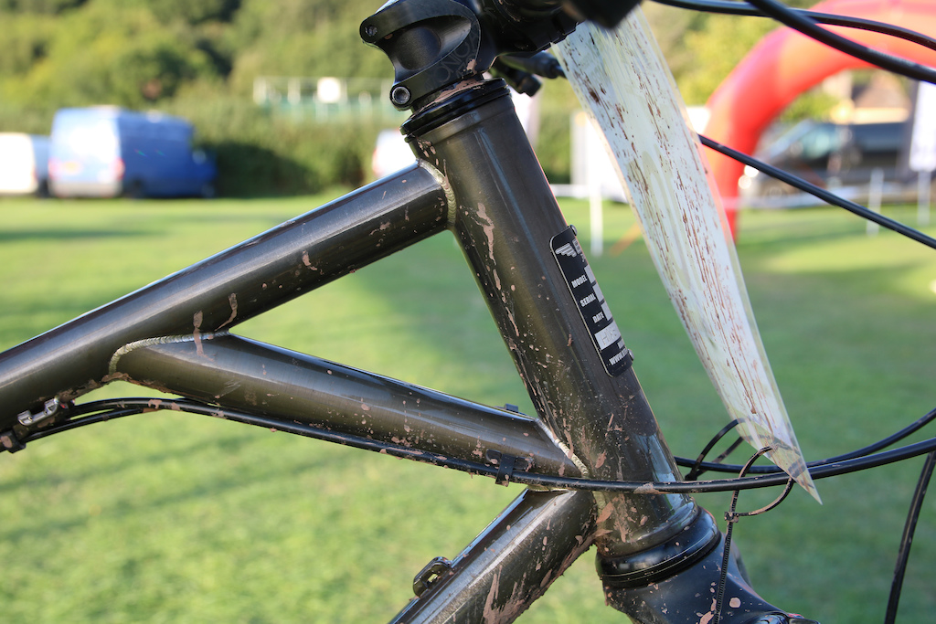 The front-end with its tall head tube has been reinforced with a strut between the down tube and top tube.