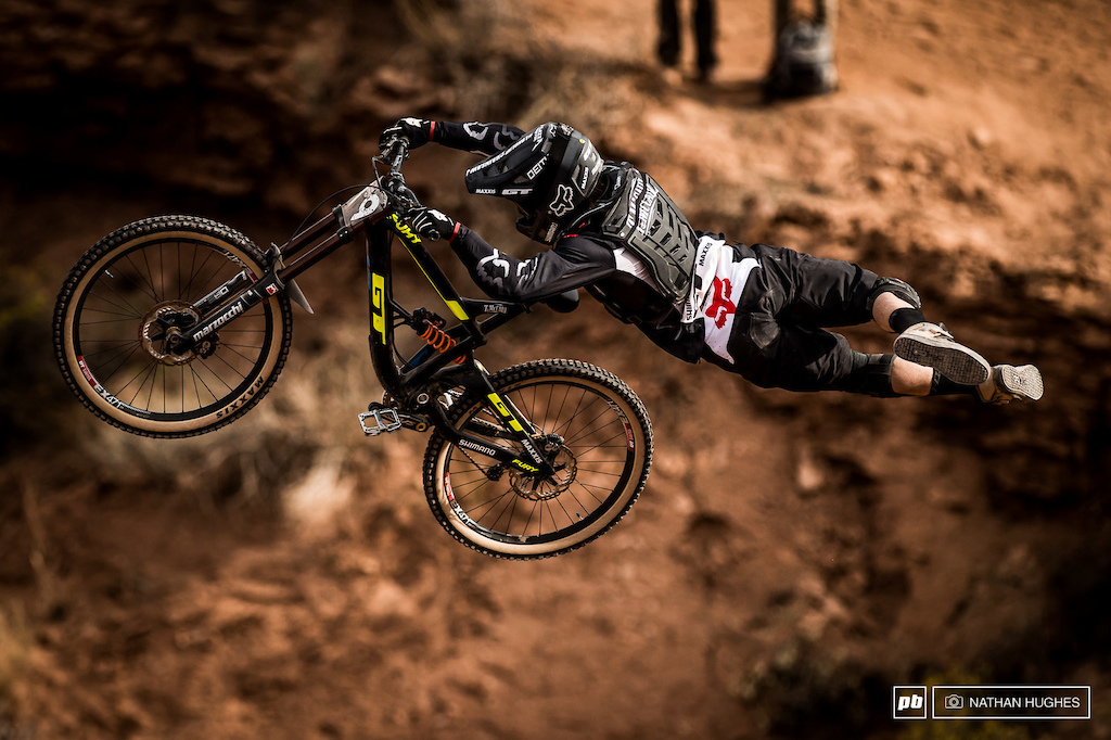 Tyler McCaul stretching out after a long descent in the saddle down to his big hip jump.
