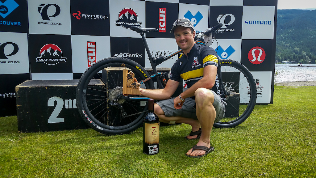 Cory Wallace shows off the BC Bike Race overall trophy.