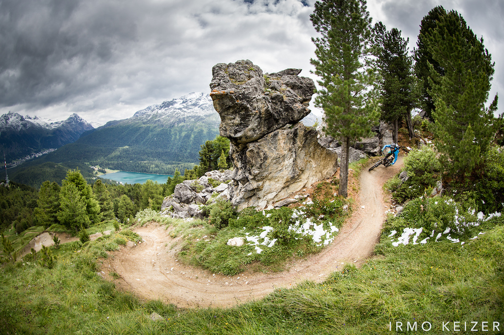 On a wintery summer day, Nicolas Baisin charges down the Corviglia flow trail above the Swiss town of St Moritz.