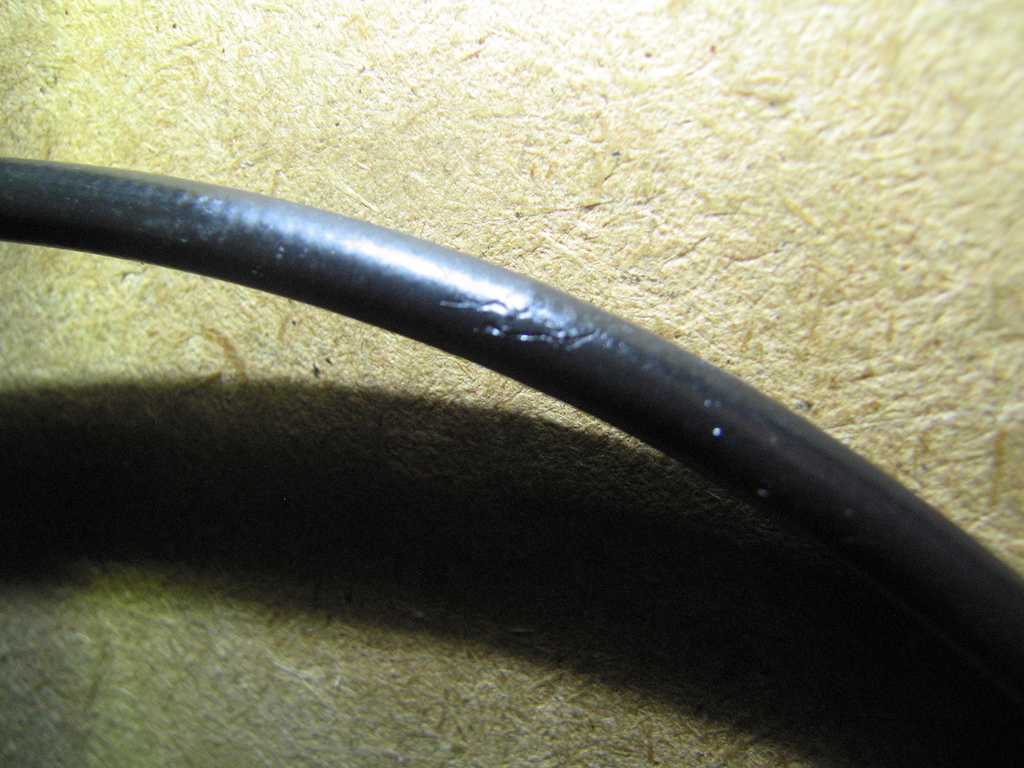 Slices in hose closest to calliper.