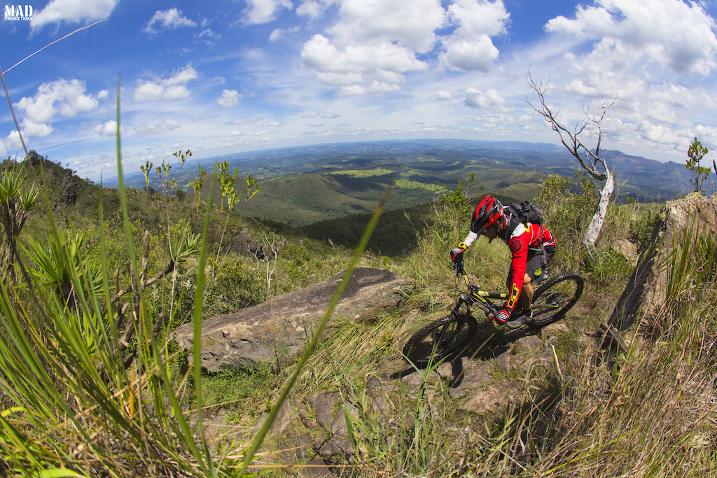 If everything around you looks flat, smile, you're on the top of the mountain beginning an epic descent. Bernardo Cruz riding Belo Horizonte slave paths during our adventure to Brazil !