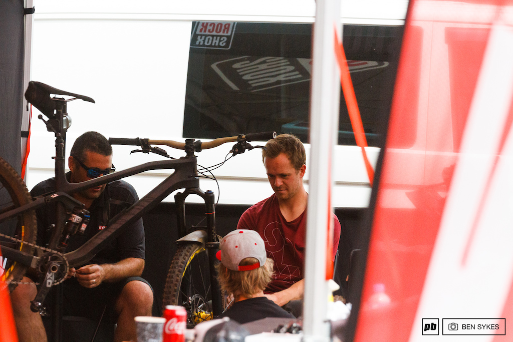 Brosnan enjoying some downtime in the pits.