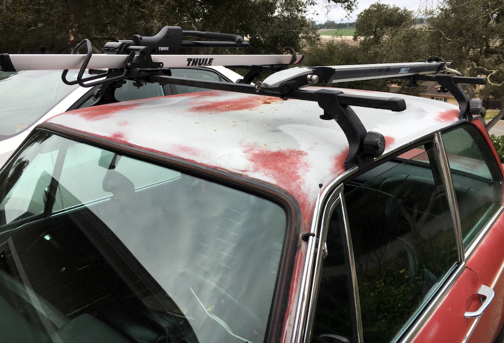 I added "matching" (raw alloy) Bike mounts to the Thule Roof rack on my BMW 2002.  The Road Bike mount that I have been using, was borrowed.  This is the final configuration.