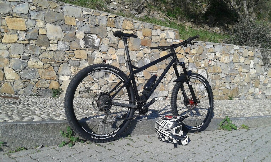 Around 14,4 kg, ignore those shitty pedals