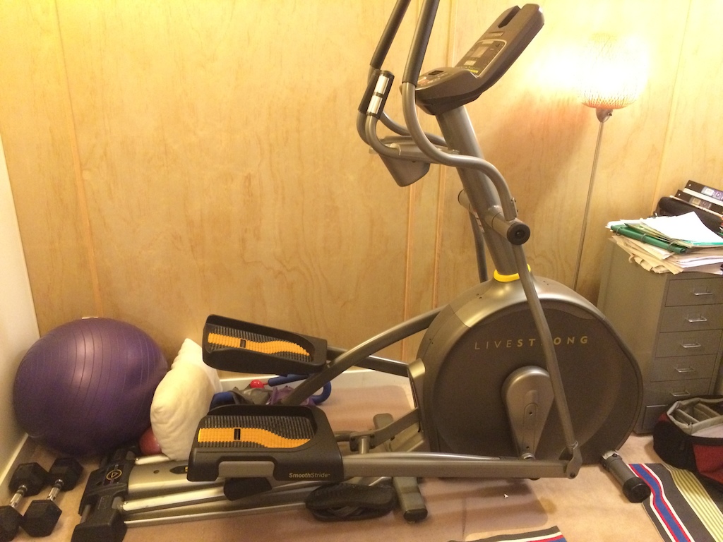 Elliptical trainer with power incline, built in speakers and fan.