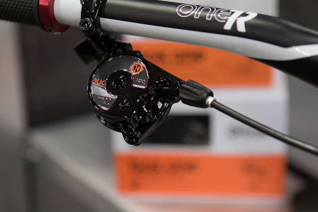 Box Components with their one lever shifter. The shifter has a down and in motion to shift back and forth. Its clean and eliminates more moving parts on the shifter. It might take a ride or two to learn the movement for your thumb but really a slick system.