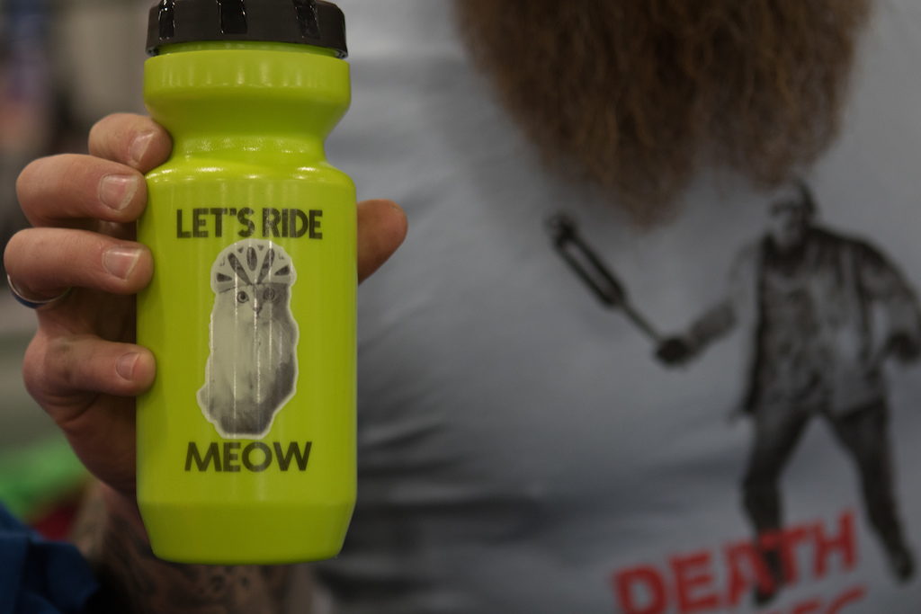 Lets ride Meow. Handlebar Mustache with some crazy Tee shirts and water bottles.