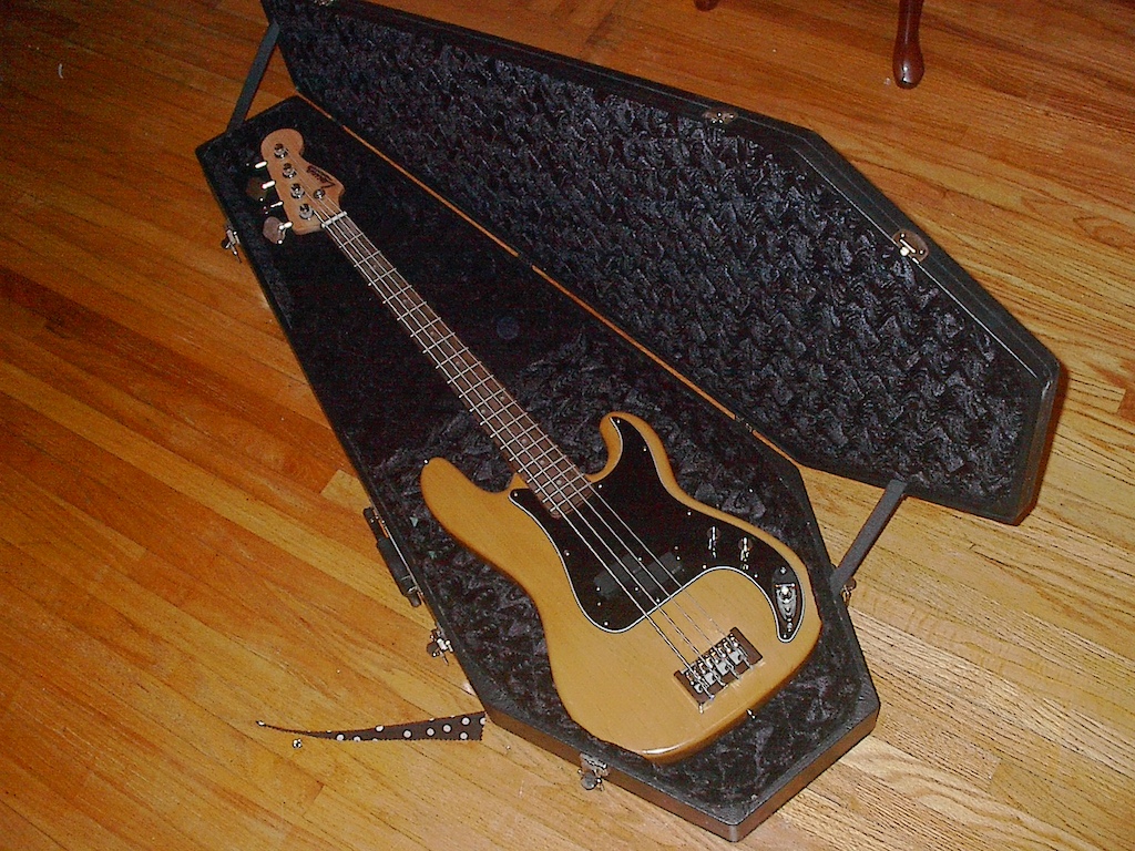 My handmade "Lewis P Monster" Custom Alder body with no comfort cut-outs, strings through the body, '62 Fender P neck that I shaped to feel like my old B.C. Rich Eagle, EMGs with 18v preamp.  Dunlop strings in drop B tuning down tuned four steps.
\m/ \m/
