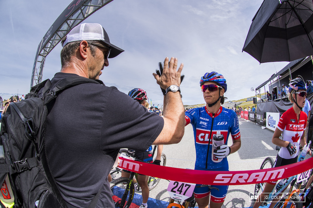 Pre race jitters? Not with the Clif team. Katerina Nash and team manager Waldek with the high five.