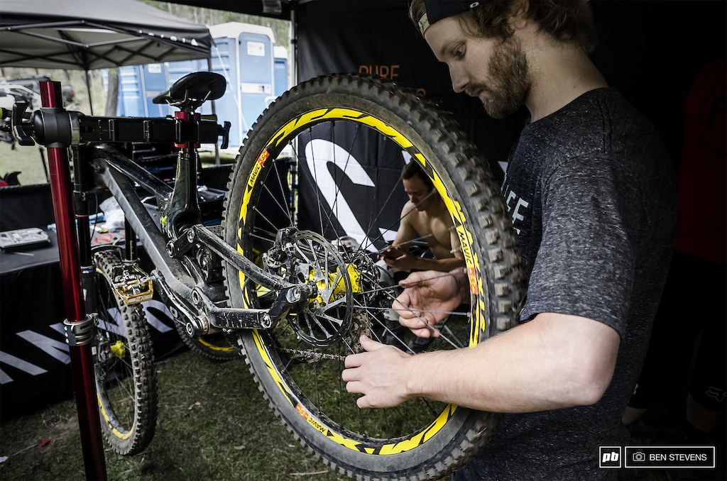 Canyon mechanic getting troy's bike dialled for the weekend.
