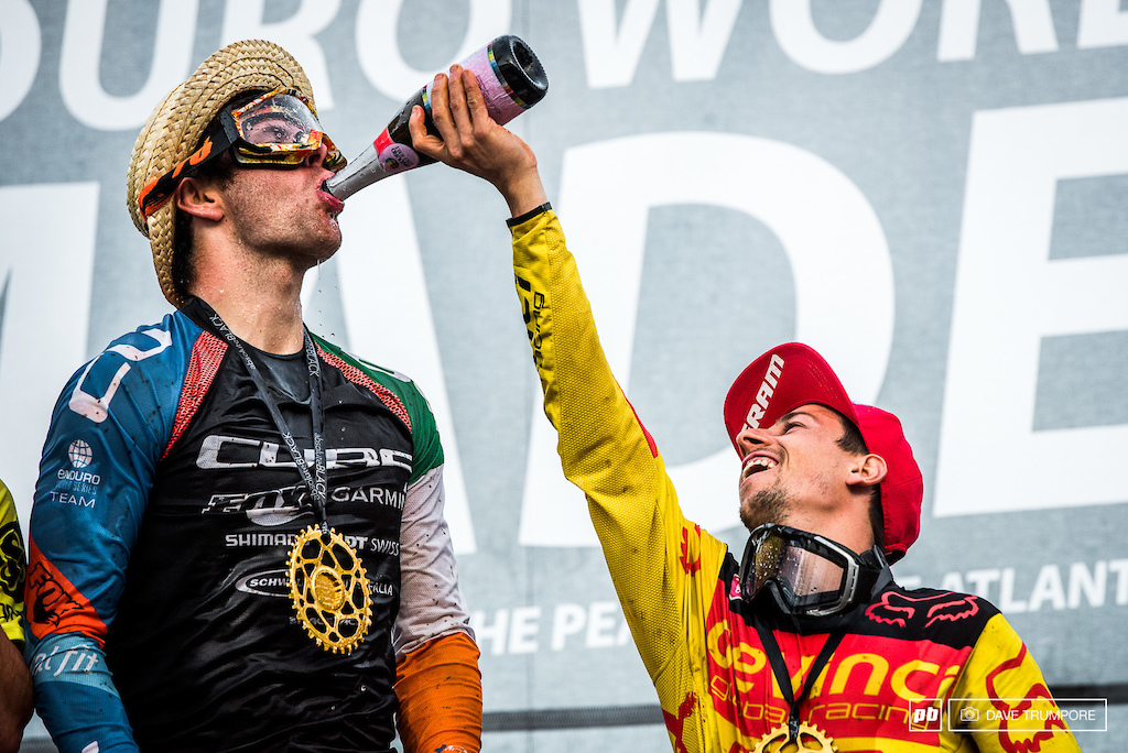 Friends make sure friends drink their share when on top of the podium.