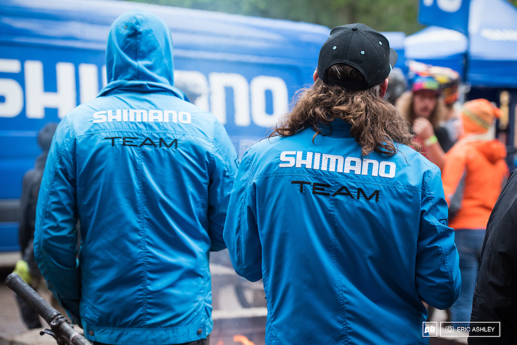 The Shimano Team takes a well earned break to enjoy a beer and the fire after a long day of keeping rider s bikes working.