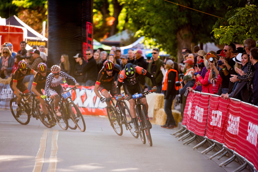 Nick Gould leads a pack of around a corner during the Pro Men's Fat Tire Crit on Friday.