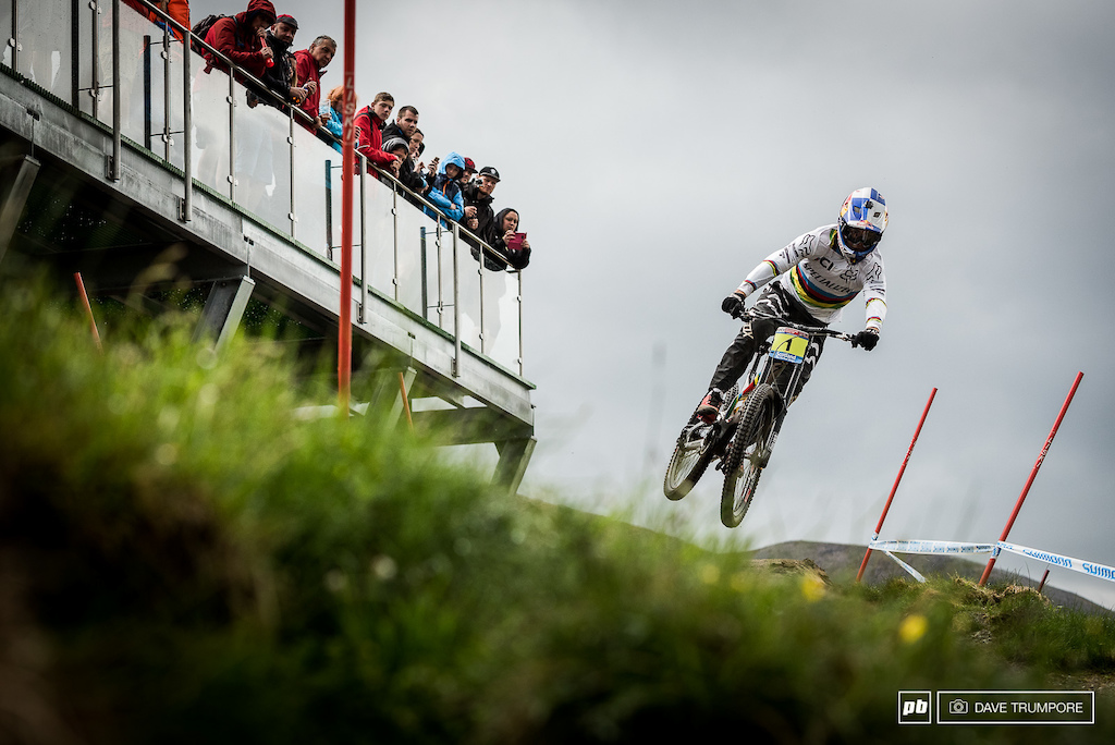 The crowds made it all the way tot he top to cheer as Finn Iles drops into the track on his qualifying run.