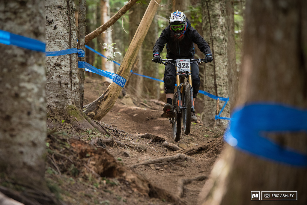 William Floyd airs out of a g-out through the roots near the bottom of the course (Cat 1 Men 19-29).