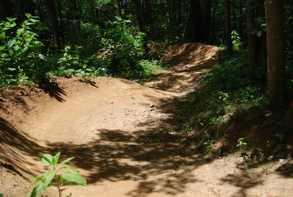 dialed flowy berms on banshee basking in the sun.