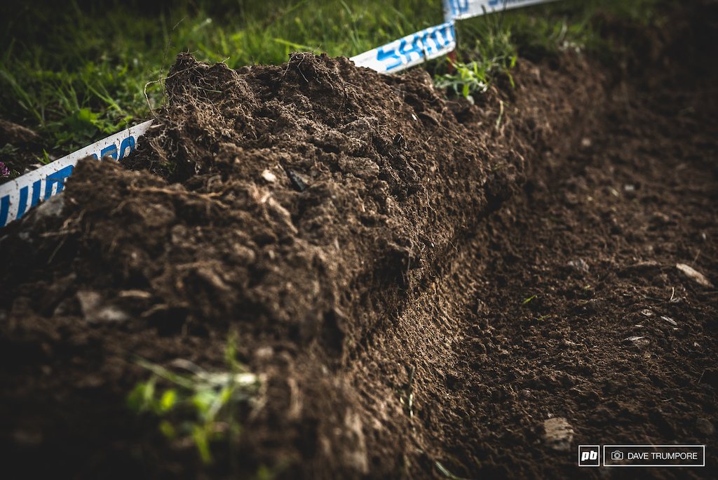 Who needs man-made berms when riders can make one naturally out of  a loose and muddy off-camber.