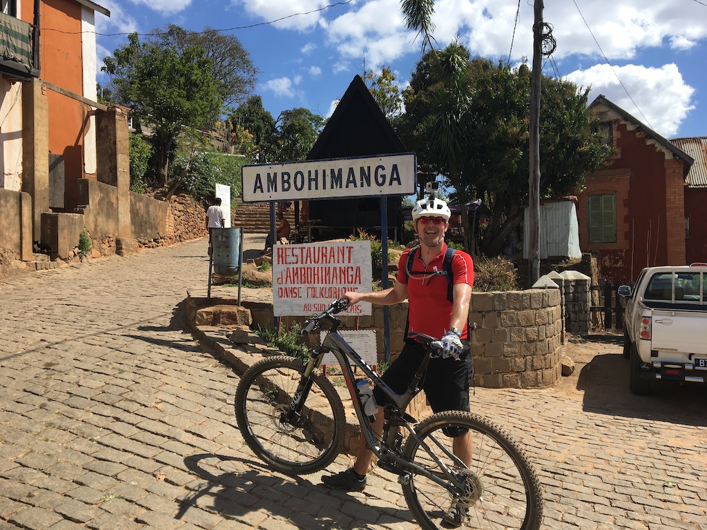 Riding in Madagascar. Fantastic trails. Very hot, no shade, lots of climbing. We stopped off at this former palace at the top of a huge climb for a much needed cold beer
