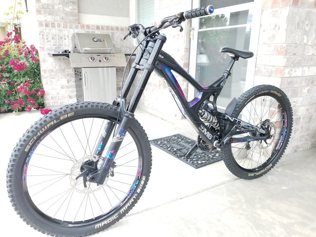 Galaxy themed Intense M16A. Decals by PB user NLDESIGNS. 
Large Aluminum Frame
Fox 40 Performance Elite Fit4 damper black stanchions
Fox RC4 shock with Ti spring, Kashima coat.
Deity Cockpit
Saint Brakes and Derailleur 
MTX33 wheels
RaceFace Cranks